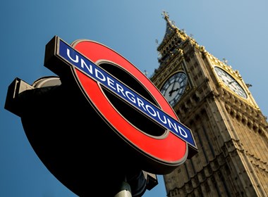 Iconic London underground sign in front of Big Ben.jpg